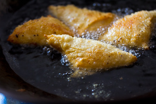 Frying Samosas